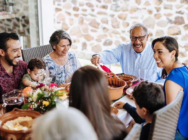 a group of people at a dinner party