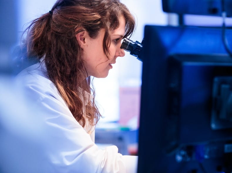A woman working in a laboratory