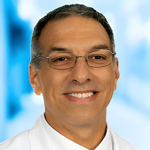 Headshot of Dr Lee on white and blue background