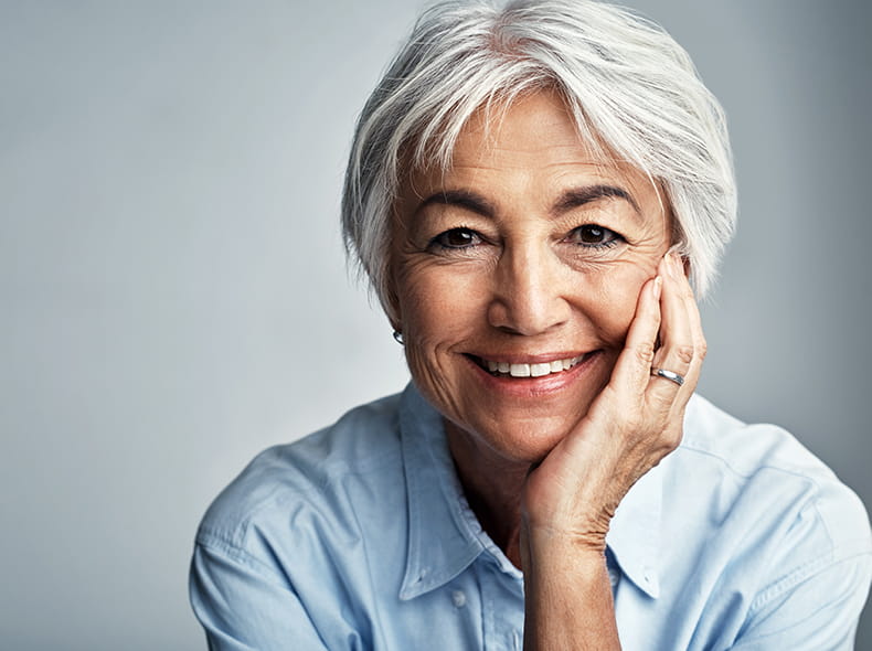 A woman smiling