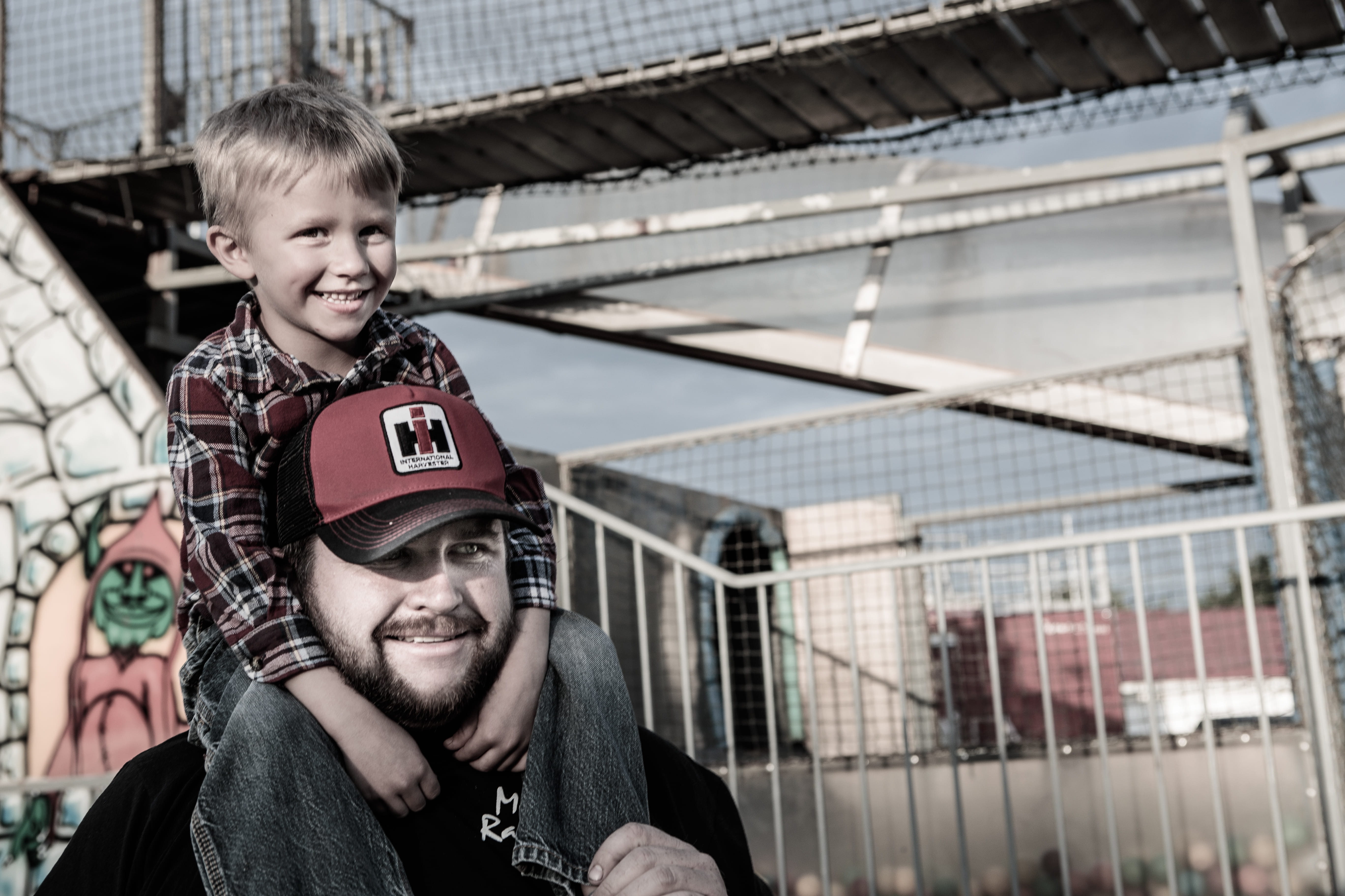 father and son at amusement park